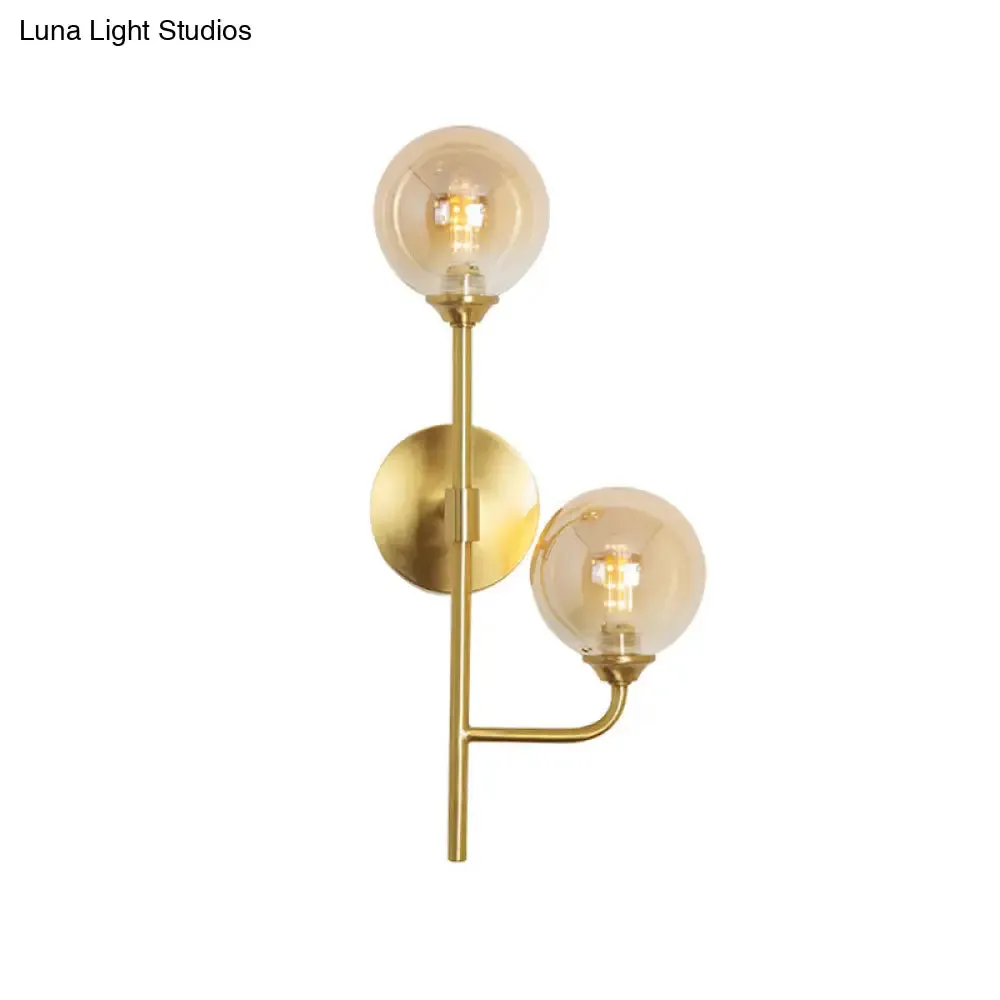 Amber/Smoke Gray Glass 2-Head LED Wall Sconce - Sphere Bathroom Wall Mount Light with Brass Finish