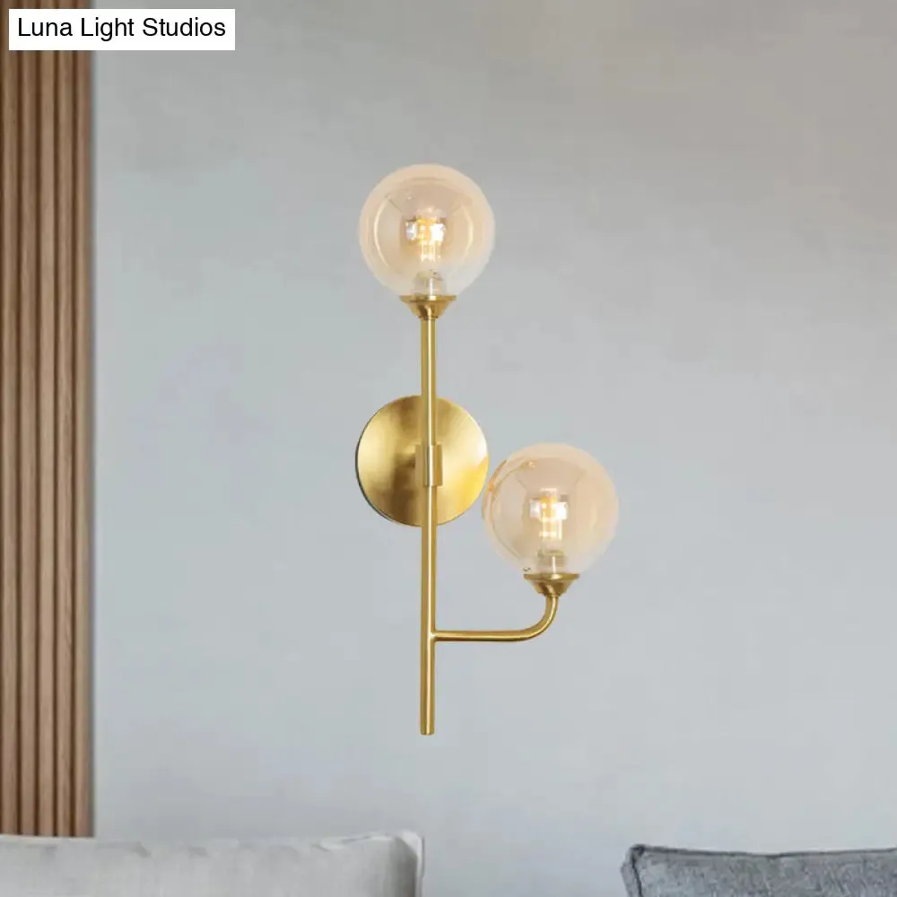 Amber/Smoke Gray Glass 2-Head LED Wall Sconce - Sphere Bathroom Wall Mount Light with Brass Finish