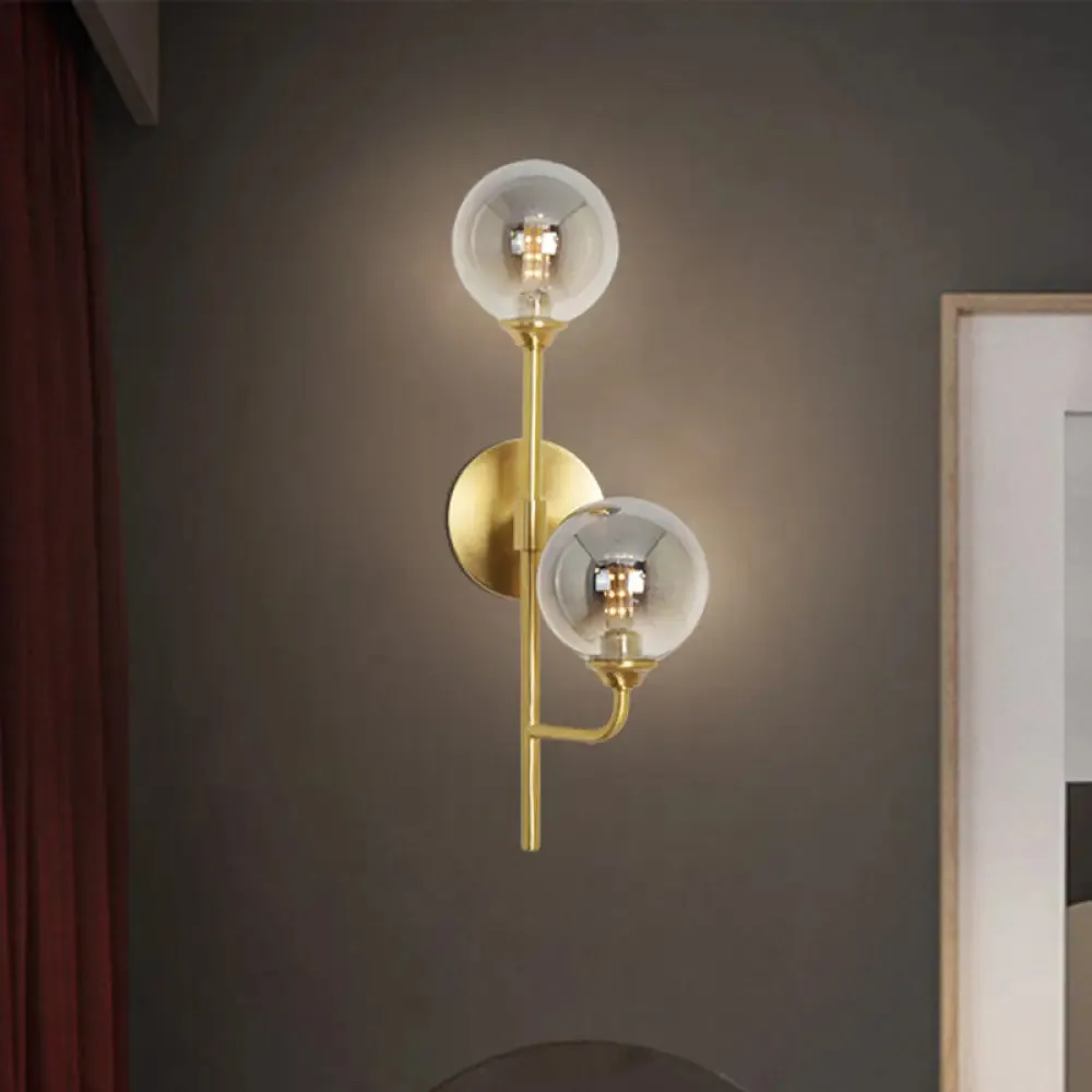 Amber/Smoke Gray Glass 2-Head LED Wall Sconce - Sphere Bathroom Wall Mount Light with Brass Finish