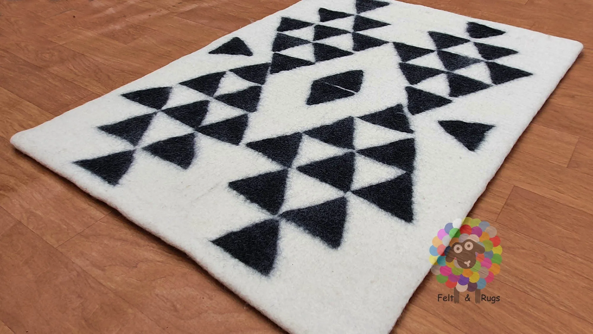 Wool Felt Rug . Handmade from 100 % wool very thick (12 mm to 15 mm thickness) sturdy and warm. (Free Shipping)