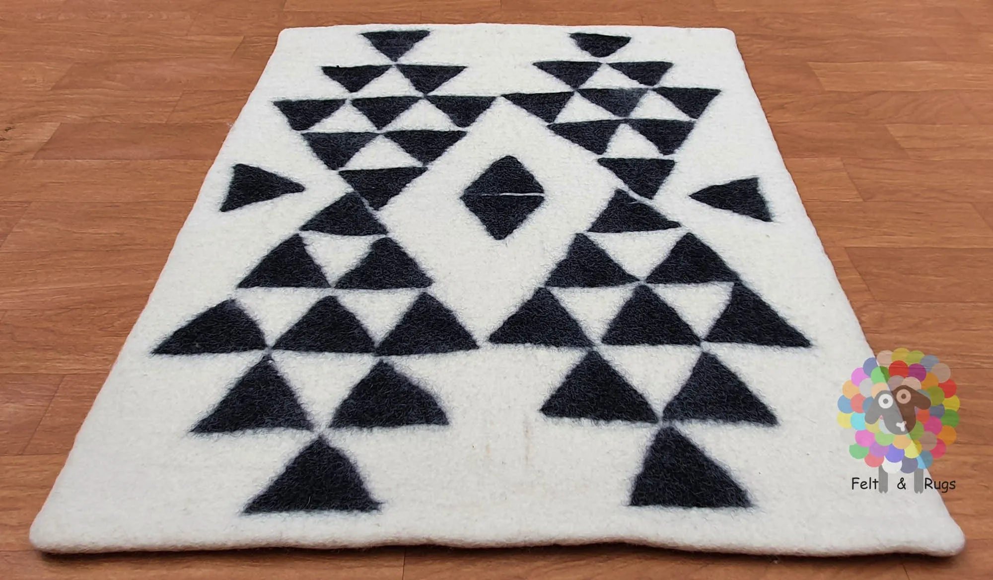 Wool Felt Rug . Handmade from 100 % wool very thick (12 mm to 15 mm thickness) sturdy and warm. (Free Shipping)